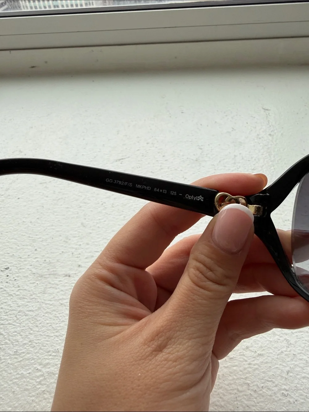 Gucci Black Oversized Oval Sunglasses with Heart Accent